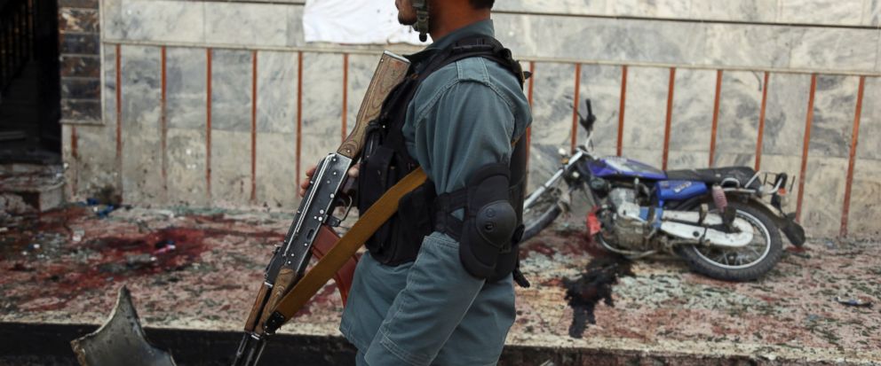 A day after ISIS kills 57, Taliban attacks kill 14 troops, policemen